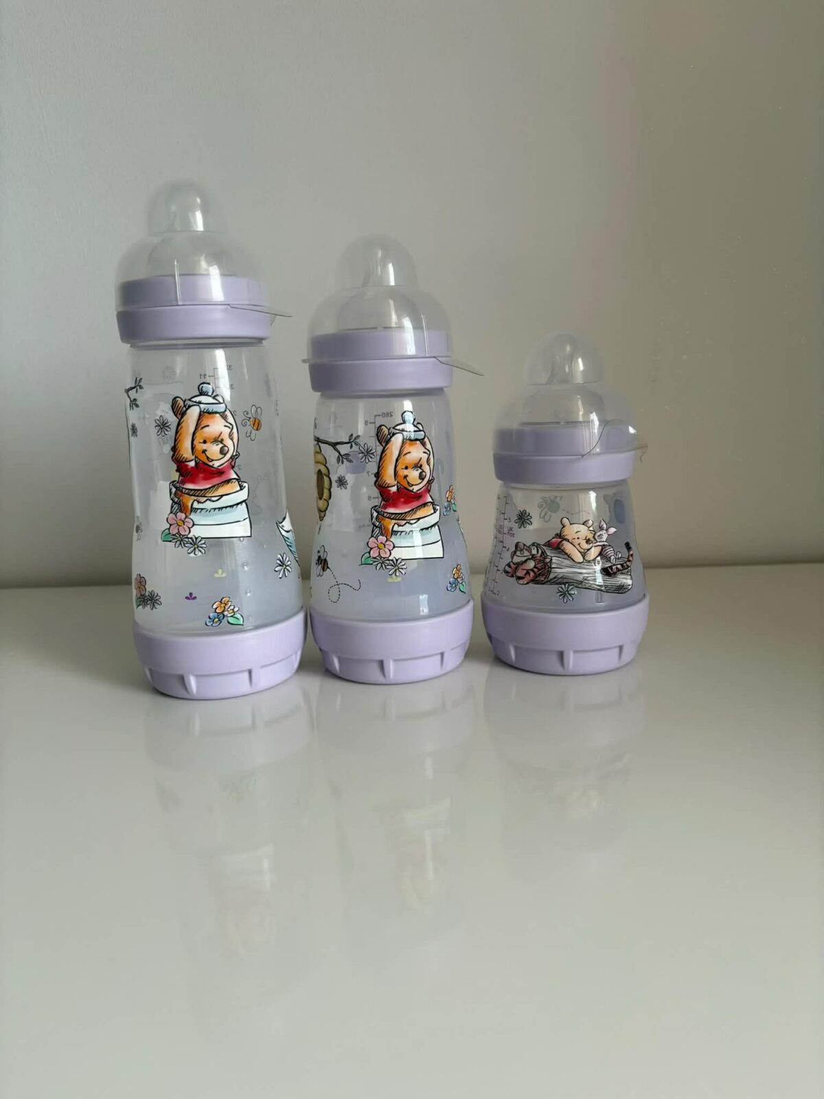 Lot 3 biberons Winnie l ourson