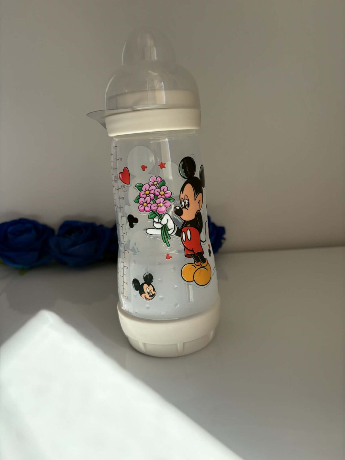 Biberon Mickey fleurs